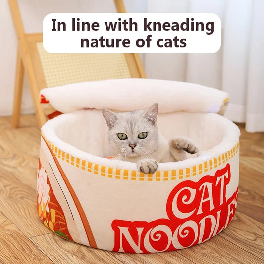 Cat curled up comfortably in heated cat bed