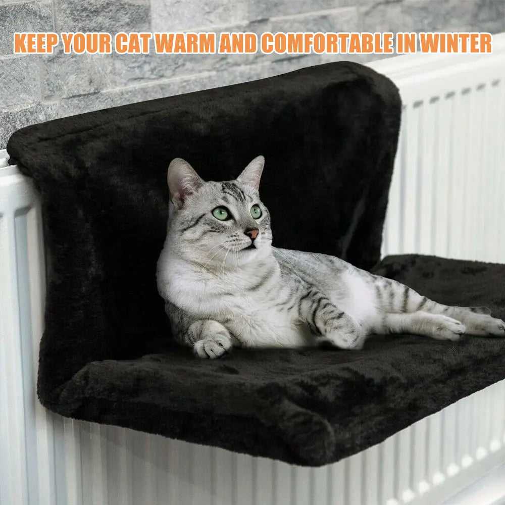 Cat radiator bed with plush fleece cover hanging on radiator